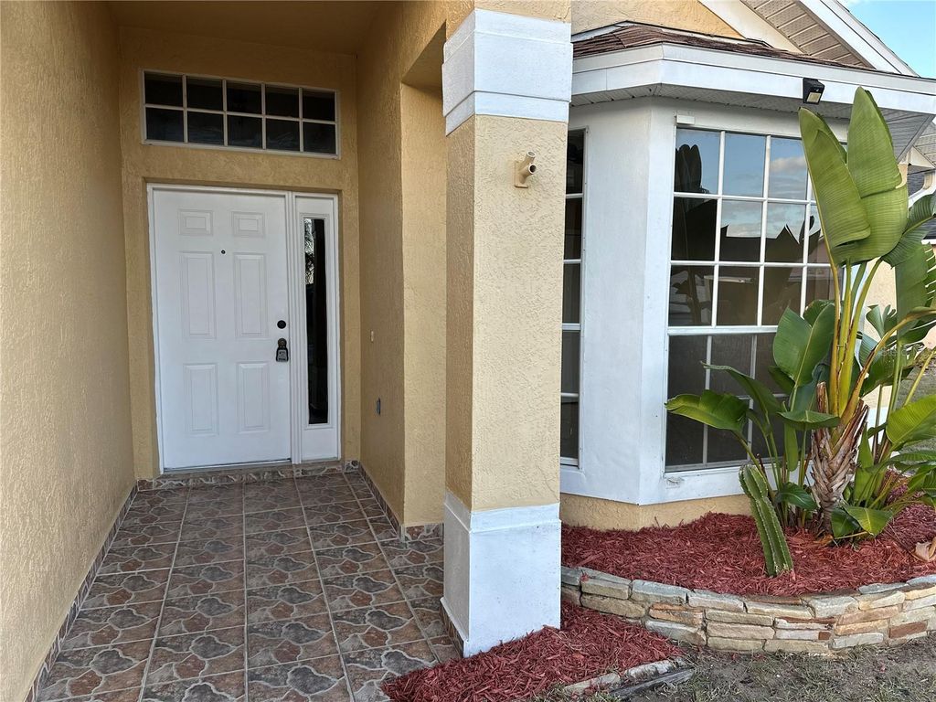 Photo of 128 Queen Mary Drive, Davenport, FL 33837 (MLS # G5106210)