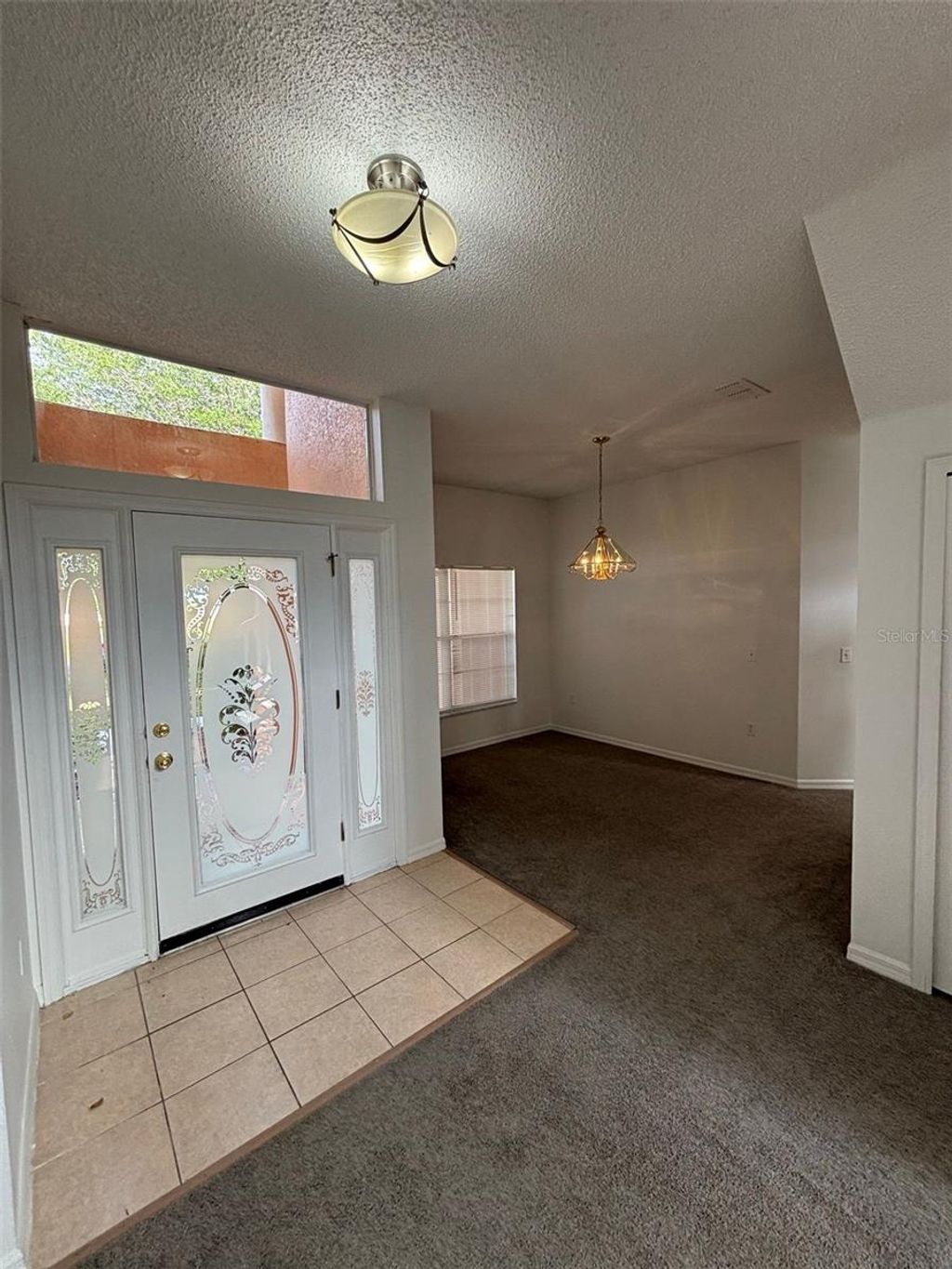 Photo of 157 Cimarron Lane, Poinciana, FL 34759 (MLS # S5148003)