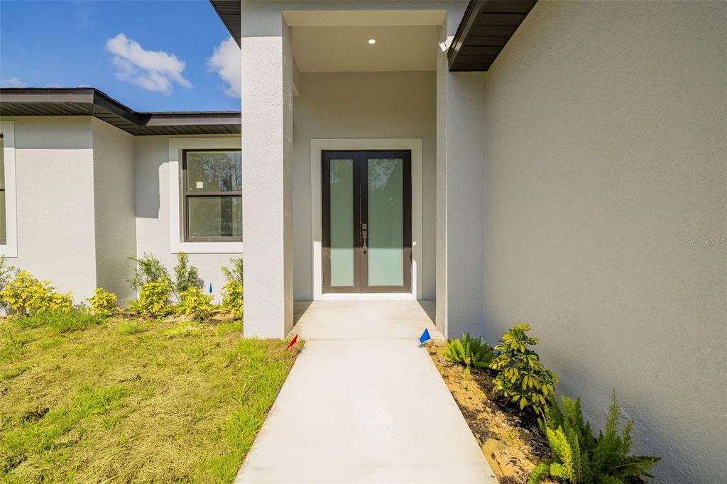 Photo of 355 Milton Street, Port Charlotte, FL 33954 (MLS # C7510421)