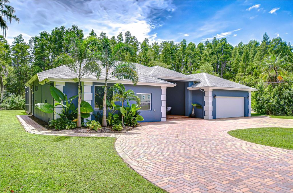 Photo of 15907 Race Track Road, Odessa, FL 33556 (MLS # TB8424188)