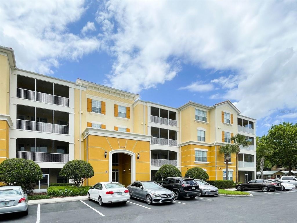 Photo of 3368 Robert Trent Jones Dr #308, Orlando, FL 32835 (MLS # O6389925)