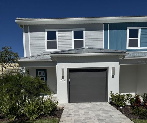 Photo of 7905 W Spectrum Drive W, Kissimmee, FL 34747 (MLS # O6352100)