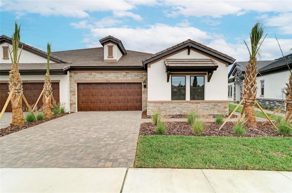 Photo of 35563 Stableton Lane, Zephyrhills, FL 33541 (MLS # TB8470675)