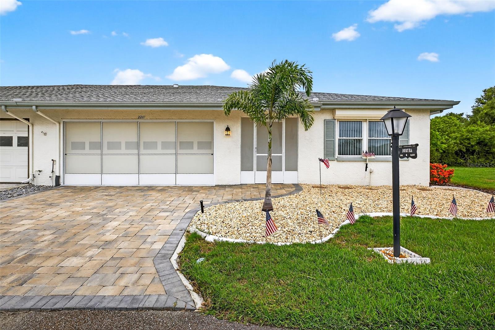 Truly move in Immaculate and well-maintained home located next to an open area, with no direct neighbor on one side. The home features attractive laminate flooring throughout and new double-pane windows; the DR has hurricane-rated windows, and the rest have roll-down storm shutters for peace of mind. And, sooo many closets. Enjoy the charm of chair rails and the comfort of updated bathrooms. The kitchen has been tastefully upgraded with quality wood cabinetry, spotless Corian countertops and newer appliances—perfect for any home chef. The spacious, updated primary bathroom features a skylight for natural light and a beautiful tiled shower. The inside laundry room comes complete with a washer, dryer, and utility sink for added convenience. A 1.5-car garage provides plenty of space for both a vehicle and a golf cart, and includes built-in cabinets for extra storage.
Kings Point includes countless resort style amenities, there are 2 clubs; one on the north side and one on the south, with a total of 6 pools, hot tubs, 27 holes of golf (membership required), fitness center/spa, billiard room, card and game rooms, tennis courts, pickleball courts, social clubs, classes, and more! The South Club is very close and includes a restaurant and bar as well as a huge pool area where BBQs and events are held pool side. The North club includes a Theatre set up for shows. Easy access to beaches, Tampa and Sarasota.