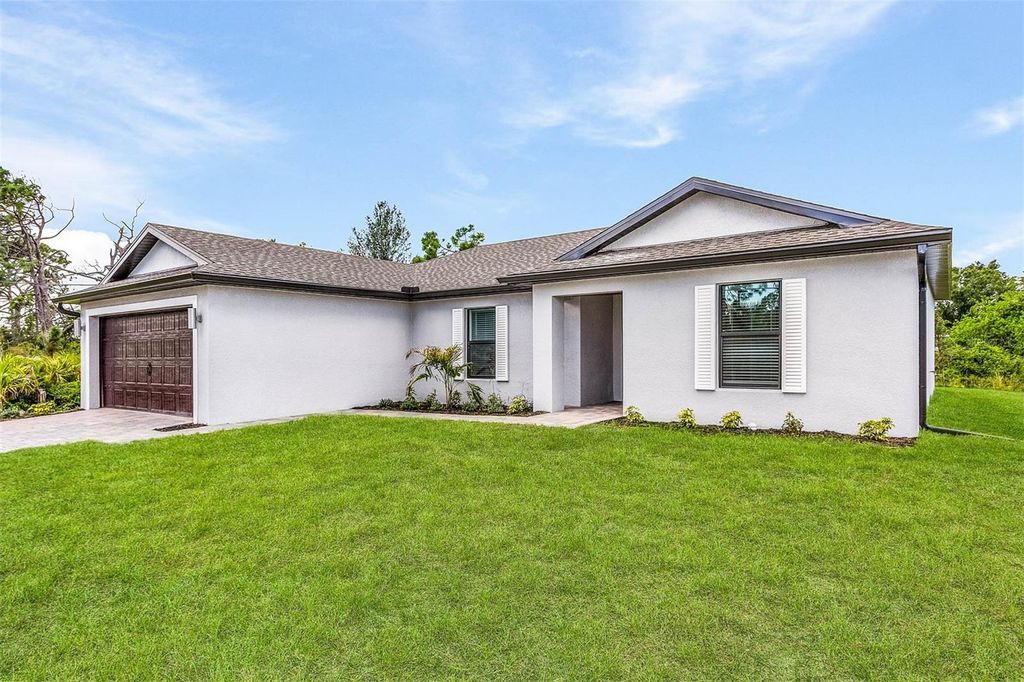 Photo of 6007 Gillot Boulevard, Port Charlotte, FL 33981 (MLS # TB8506411)