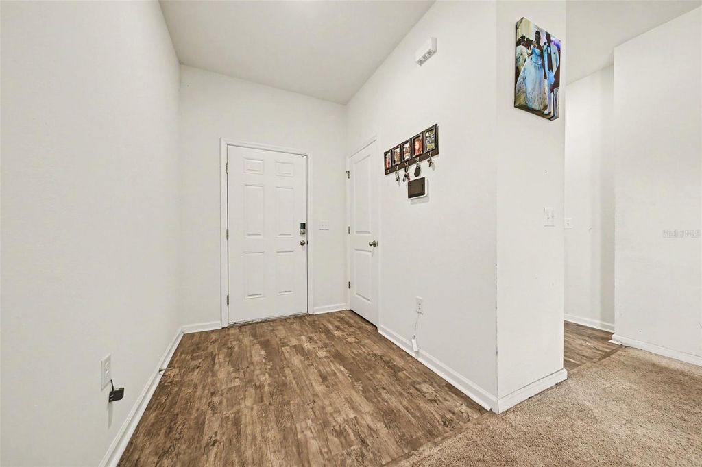 Photo of 1006 Commuter Dr, Deltona, FL 32738 (MLS # O6413938)