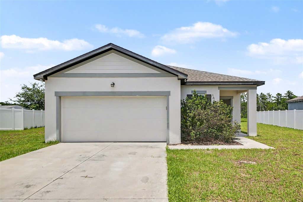 Photo of 1006 Commuter Dr, Deltona, FL 32738 (MLS # O6413938)