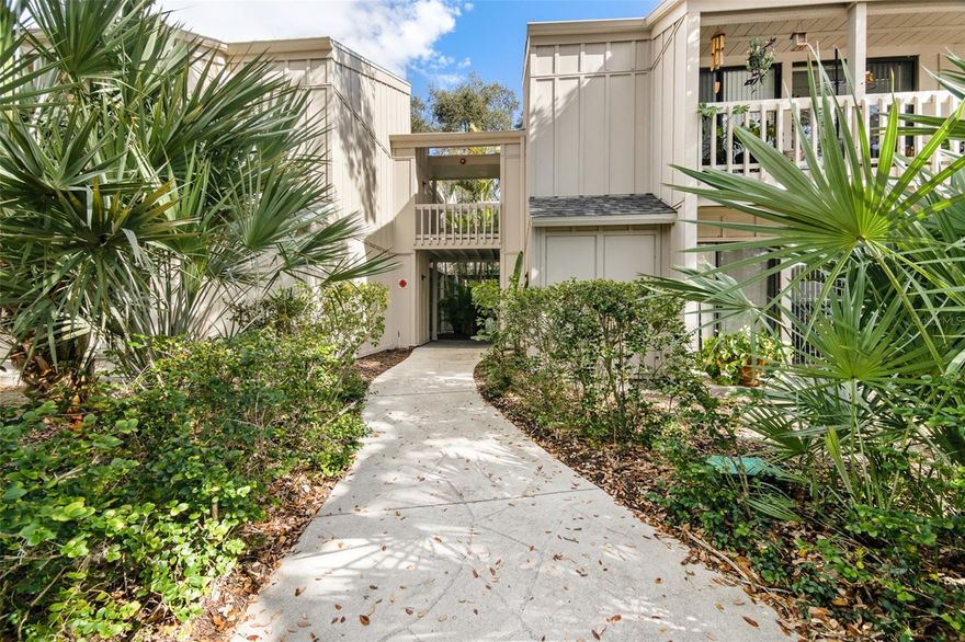 Step into this stylishly updated 2 bed, 2 bath condo just minutes from vibrant downtown Sarasota!  Light-filled and airy, this inviting, quiet, second floor unit offers a fantastic location near top restaurants, boutique shopping, and only a 15 minutes walk to Sarasota Memorial Hospital-ideal for snowbirds, healthcare professionals, or anyone craving convenience with a touch of tranquility.  Enjoy 2 tastefully renovated bathrooms featuring light cabinetry, classic subway tile, glass shower doors, and modern fixtures.  The lofted ceiling and transome windows provide light and spaciousness.  The kitchen shines with stainless stell appliances, granite countertops, a new Kohler sink, and updated hardware--perfect for whipping up meals or entertaining guests.  Two screened balconies let you soak in the peaceful wooded views and Florida Breezes.  Additional updates include new interior doors, window treatments, upgraded electrical outlets and switches plus a clever lofted attic space in the primary bedroom--tucked behind a charming barn door for a bonus storage or a cozy reading nook.  Whether you're looking for a seasonal getaway or a full-time retreat, this move-in ready condo offers the best of both worlds:  City energy and a quiet escape.  Come enjoy the Sarasota lifestyle you've been dreaming of!