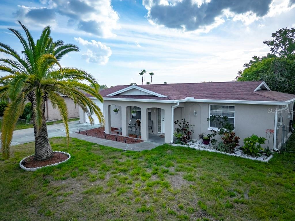 Photo of 10131 Glen Moor Ln, Port Richey, FL 34668 (MLS # S5123867)