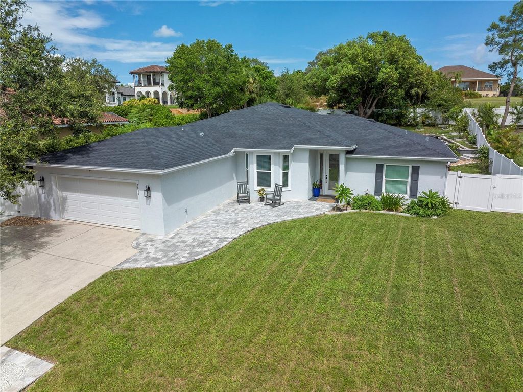 Photo of 1639 Lakeside Drive, Tarpon Springs, FL 34688 (MLS # TB8427217)