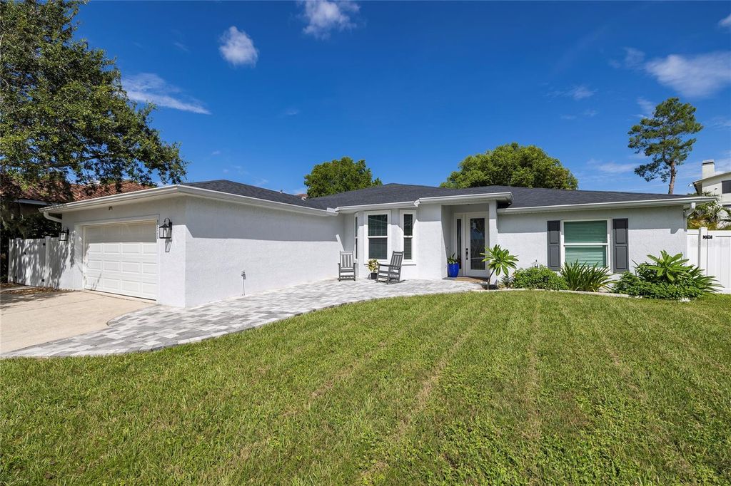 Photo of 1639 Lakeside Drive, Tarpon Springs, FL 34688 (MLS # TB8427217)