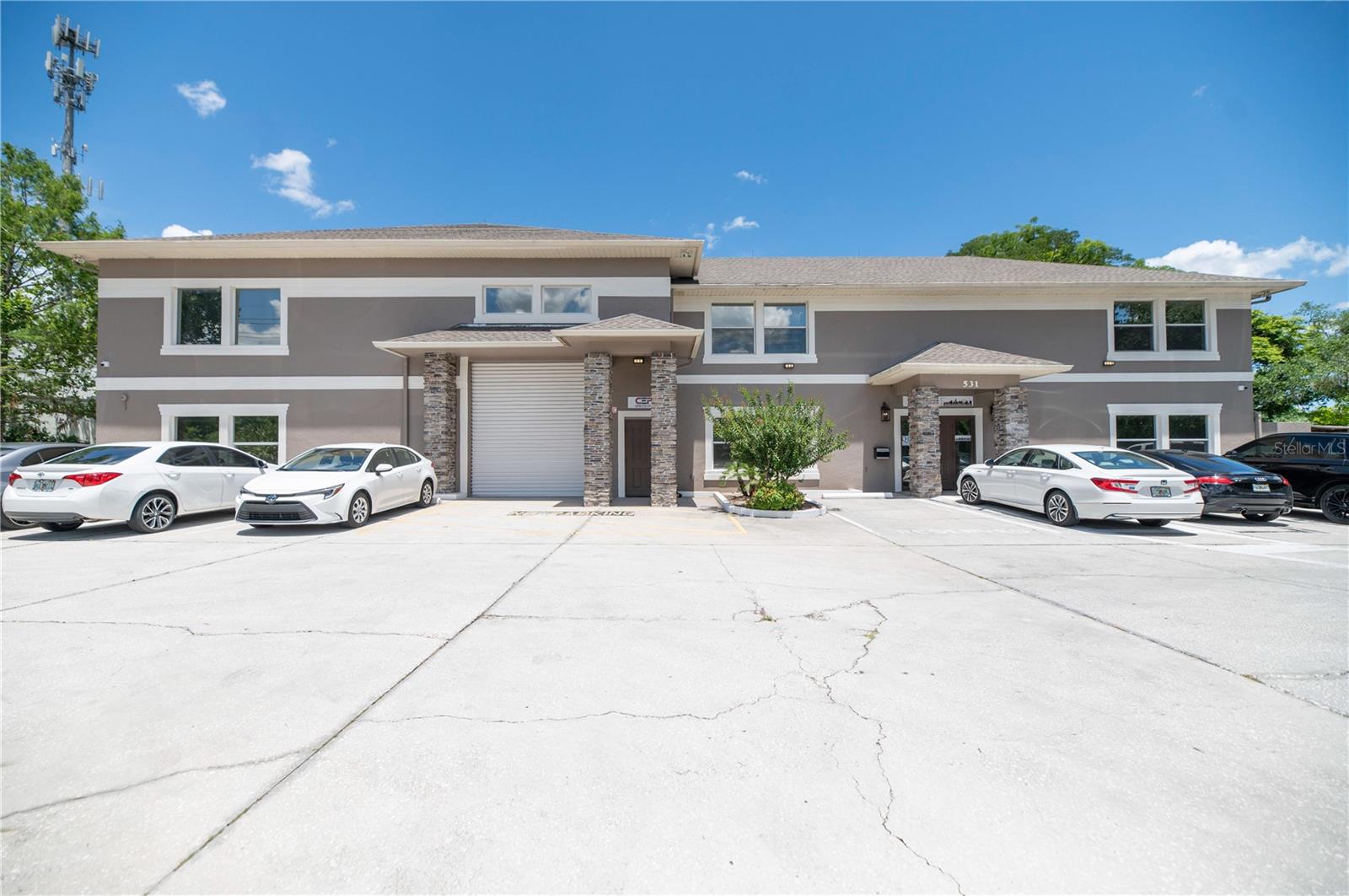 Prime Mixed-Use Commercial Building in Altamonte Springs! Located directly on State Road 434, this property offers exceptional visibility for your business. Perfect for owner operators or leasing opportunities, with separate entrances for first and second-floor offices. Each floor features conference rooms, kitchen areas, and bathrooms. The first floor includes a reception area and large conference room with versatile office spaces. Upstairs, discover additional offices and facilities. The warehouse space boasts high ceilings and a partial second level. Enjoy 25 parking spaces, mature landscaping, and a spacious back deck for outdoor breaks or events. Don't miss this opportunity!