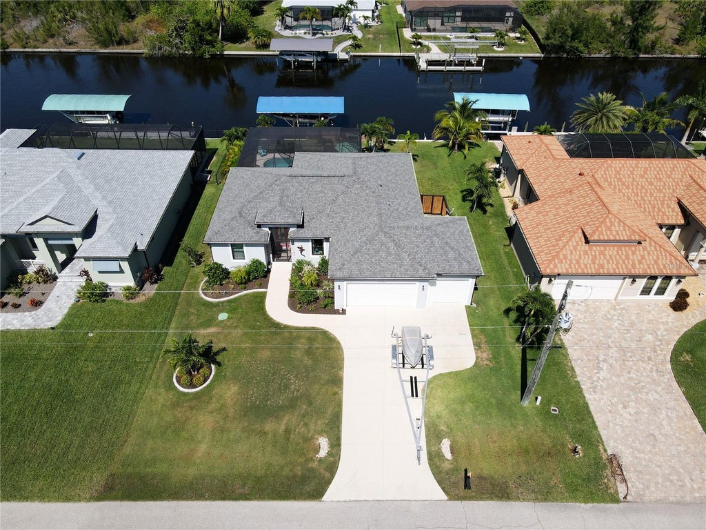 Photo of 8380 Tecumseh Circle, Port Charlotte, FL 33981 (MLS # D6149180)