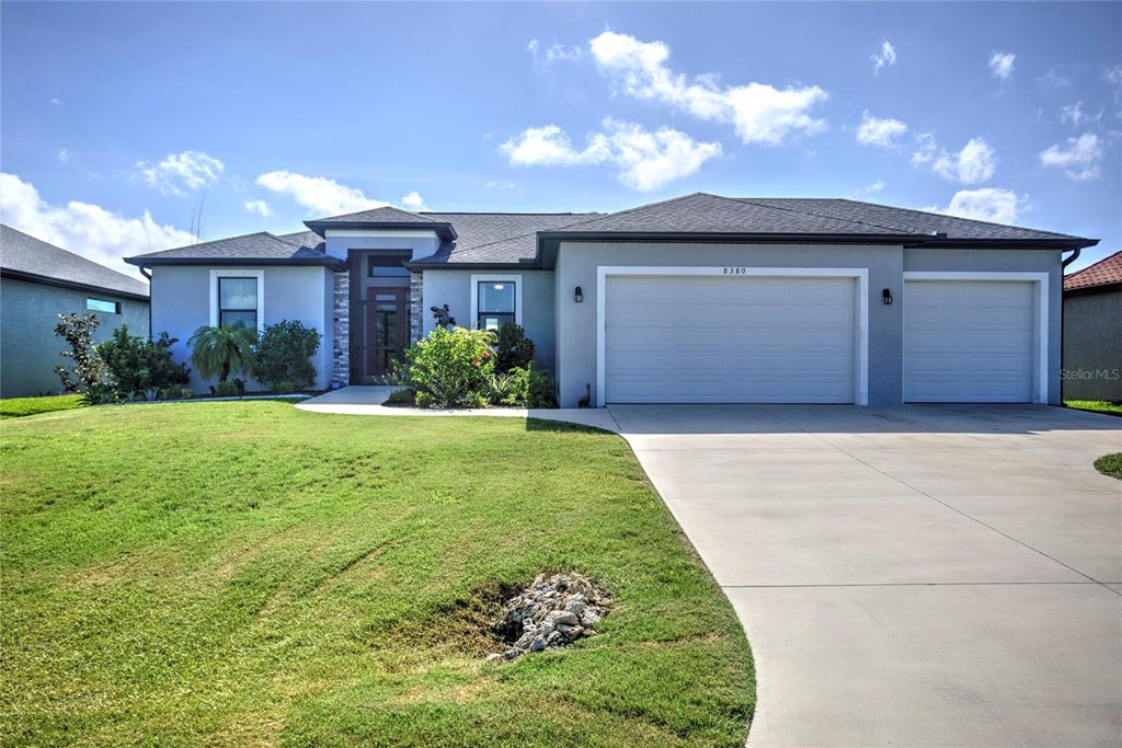 Photo of 8380 Tecumseh Circle, Port Charlotte, FL 33981 (MLS # D6149180)
