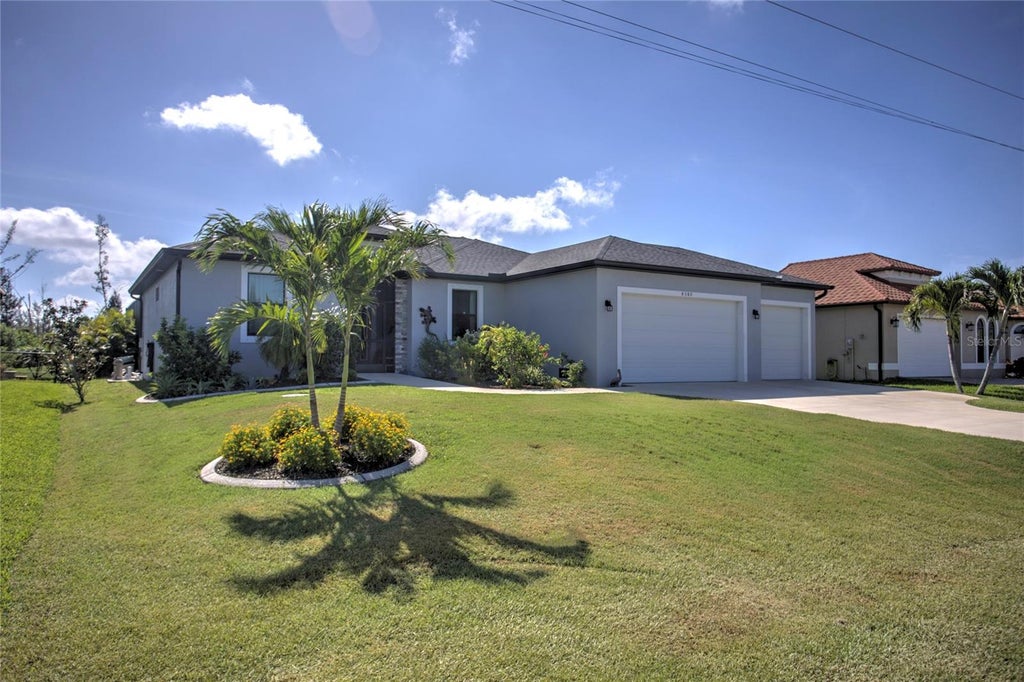 Photo of 8380 Tecumseh Circle, Port Charlotte, FL 33981 (MLS # D6149180)