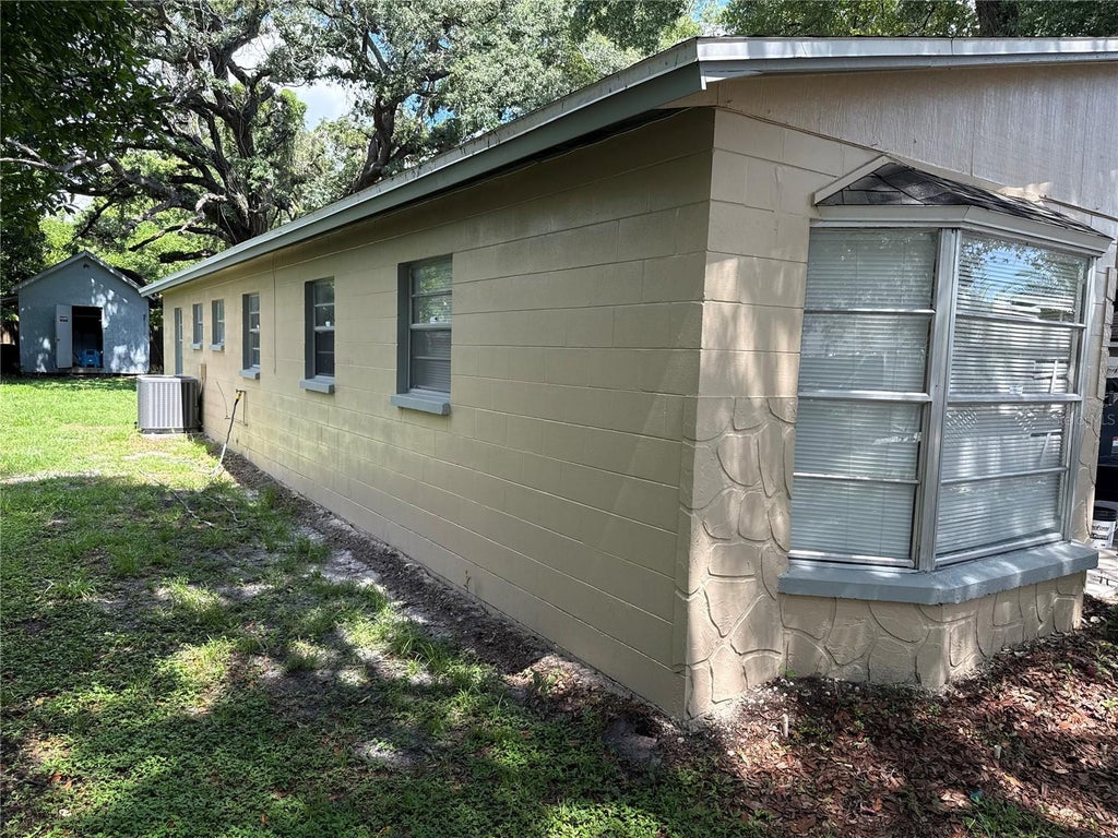 Photo of 10406 N Central Avenue, Tampa, FL 33612 (MLS # TB8528632)