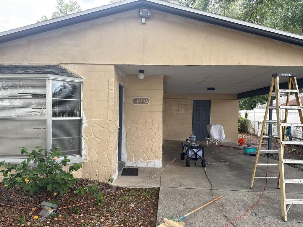 Photo of 10406 N Central Avenue, Tampa, FL 33612 (MLS # TB8528632)