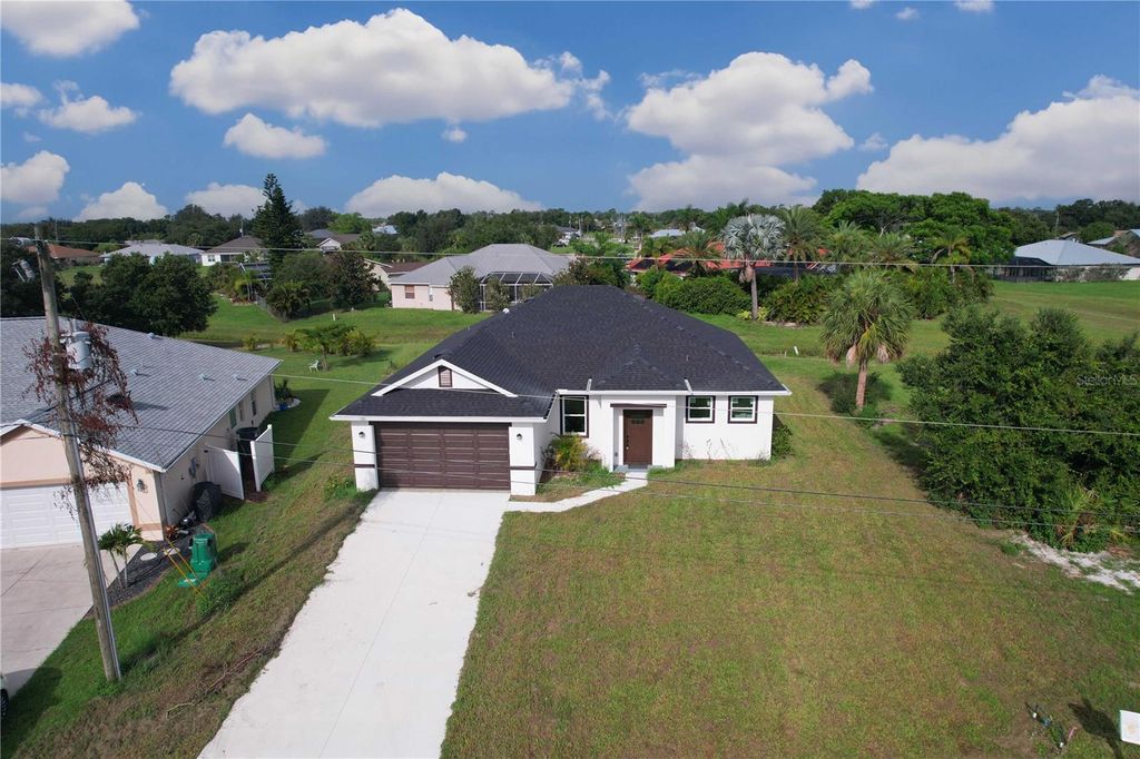 Photo of 26345 Trinilas Drive, Punta Gorda, FL 33983 (MLS # O6329089)