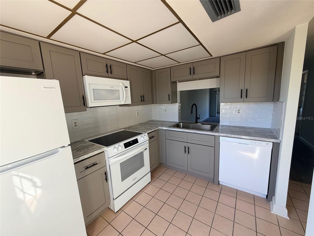 Photo of 4407 Sunstate Drive, New Port Richey, FL 34652 (MLS # TB8469472)