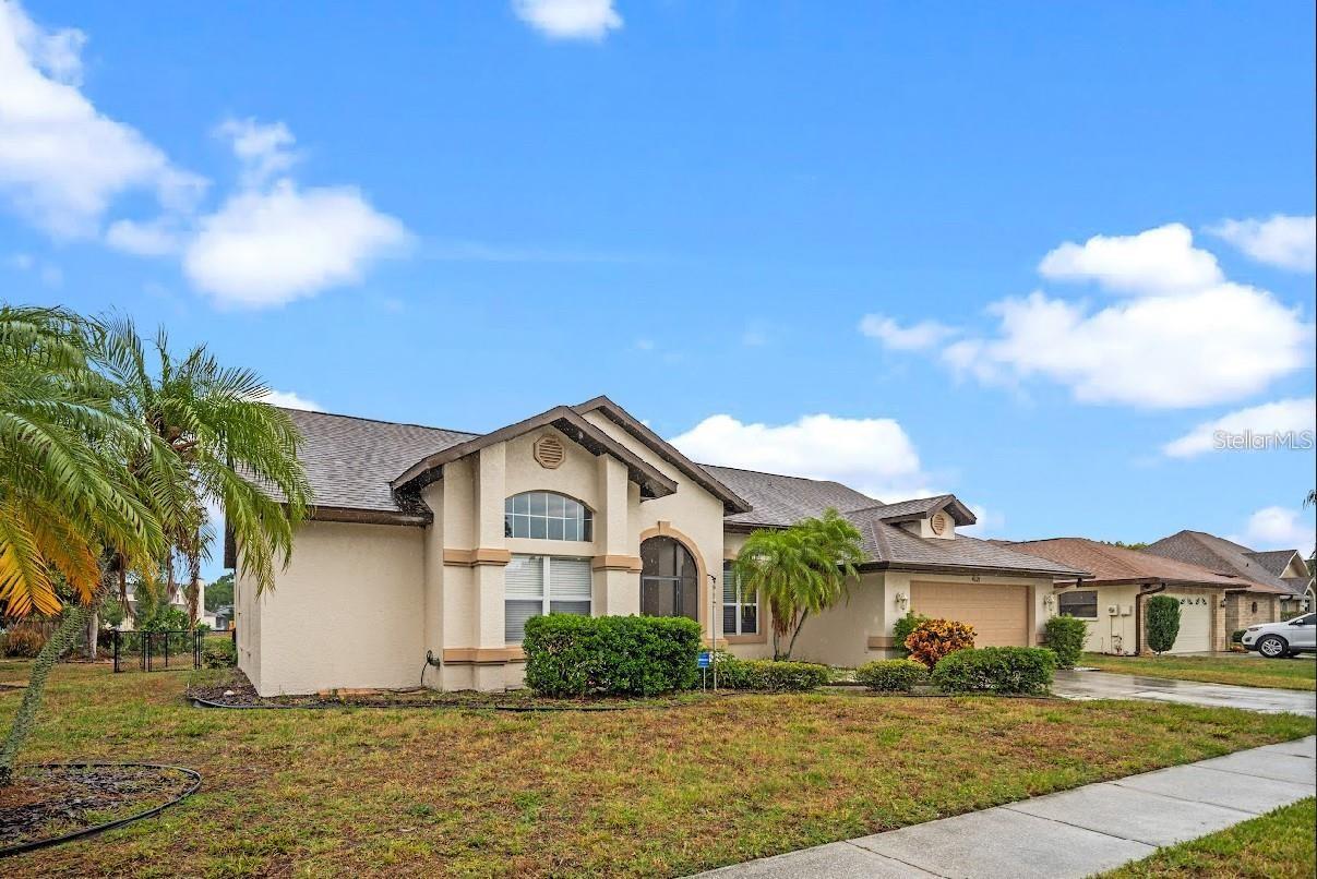 New roof and new siding! Come check out this move-in ready home located in the heart of Bradenton! This well maintained home, nestled in Manatee Oaks offers serene pond views, spacious living area, and a wood burning fireplace. The welcoming foyer entrance opens to a light and bright interior with soaring ceilings and a formal living room and dining room, perfect for entertaining many guests. The oversized kitchen features plenty of cabinet space, walk in pantry, a center island with step- up breakfast bar, and a separate desk area that provides additional counter space to work. The eat-in area allows for more casual gatherings, and is flanked by a large window overlooking the pond and a slider that leads to the enclosed lanai. There is plenty of space for relaxing, whether it is in the cozy family room in front of the wood-burning fireplace or on the enclosed lanai overlooking the back yard and pond. The spacious master bedroom offers a walk-in closet and en-suite bath with dual sinks, step up garden tub, separate shower, and also provides access to the enclosed lanai. The three additional rooms allow plenty of room for family or guests or offers the flexibility of a home office or den. Additional features of this home includes an interior laundry room, a 2 car garage, and a landscaping for a lovely curb-appeal. Located in a quiet community with low HOA fees and easy access to shopping, dinning, and I-75. Only a short drive to Florida famous sandy beaches. When will you be moving in?