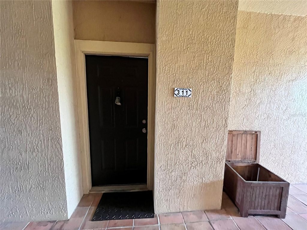 Photo of 5578 Metrowest Blvd #311, Orlando, FL 32811 (MLS # O6388696)