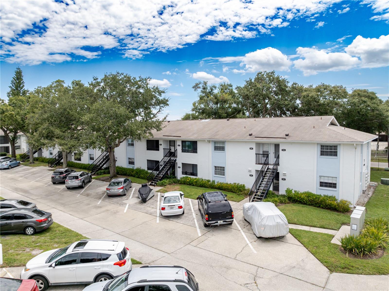 Step into easy, low-maintenance living with this updated one-bedroom, one-bath condominium located in the highly sought-after South Tampa area, one of the premier neighborhoods to call home. The kitchen features granite countertops and modern cabinetry, blending functionality with style, while the in-unit washer-dryer combo adds everyday convenience. Several major upgrades have already been taken care of, including a newer AC system, a replacement sliding glass door to the porch, and a new bedroom window—each of which represents a substantial investment that enhances energy efficiency, comfort, and long-term value. The open living and dining layout feels bright and welcoming, complemented by ceiling fans throughout. One assigned parking space is located just outside for added ease. Strategically located with quick access to Gandy Boulevard and St. Pete, plus all the dining, shopping, and entertainment South Tampa has to offer. Public transit options are also nearby, making it easy to get anywhere in the city. Fair Oaks South offers desirable community amenities including a swimming pool, clubhouse, and a small dock for relaxing or fishing, all with a low monthly HOA that helps keep ownership affordable. This move-in-ready condo delivers excellent value in a location that continues to grow in demand.