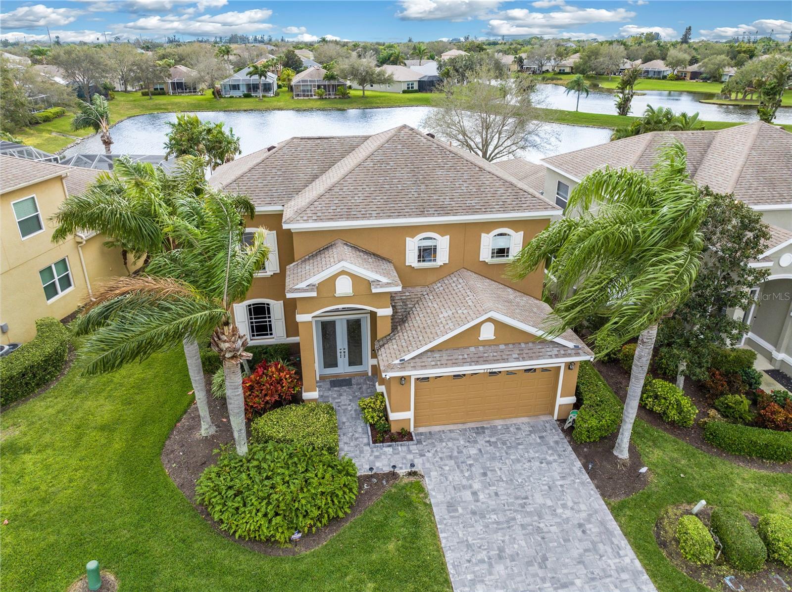Welcome Home to Palma Sola Trace Paradise! Are you ready to elevate your lifestyle? Look no further! We are thrilled to present this stunning 5-bedroom, 2 1/2-bath residence in the heart of the coveted Palma Sola Trace community. Location, Location, Location! Situated just a stone's throw from IMG Academy and mere miles from the breathtaking tropical beaches of Anna Maria, this residence is your gateway to the best of Florida living. Indulge in the convenience of being close to fine dining, shopping, and top-notch schools. Palma Sola Trace not only offers a luxurious home but also provides access to a world-class community experience. Dive into relaxation at the community pool, stay fit in the well-equipped gym, and let the little ones run wild at the playground. This is more than just a home; it's a lifestyle upgrade! New Roof 2025. Don't miss out on this extraordinary opportunity! Schedule your viewing today and let this property welcome you home to a life of luxury, convenience, and pure bliss. Contact us today for a showing!