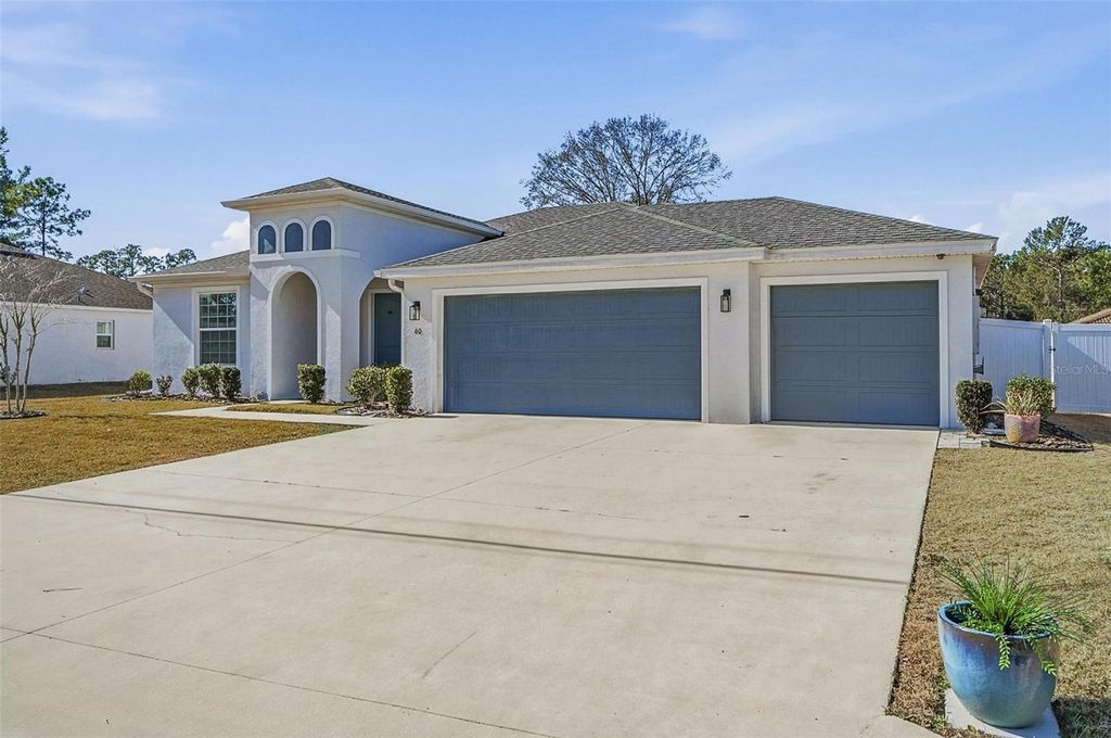 Photo of 60 Frenora Lane, Palm Coast, FL 32137 (MLS # FC315999)