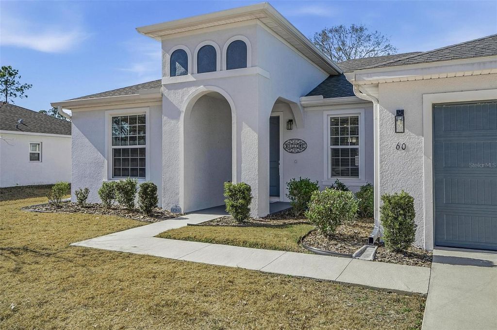 Photo of 60 Frenora Lane, Palm Coast, FL 32137 (MLS # FC315999)