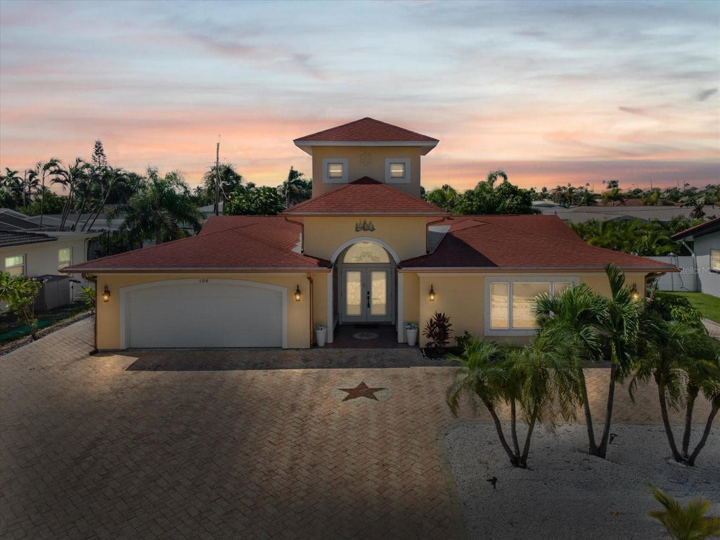 Photo of 108 24th Street, Belleair Beach, FL 33786 (MLS # TB8548471)