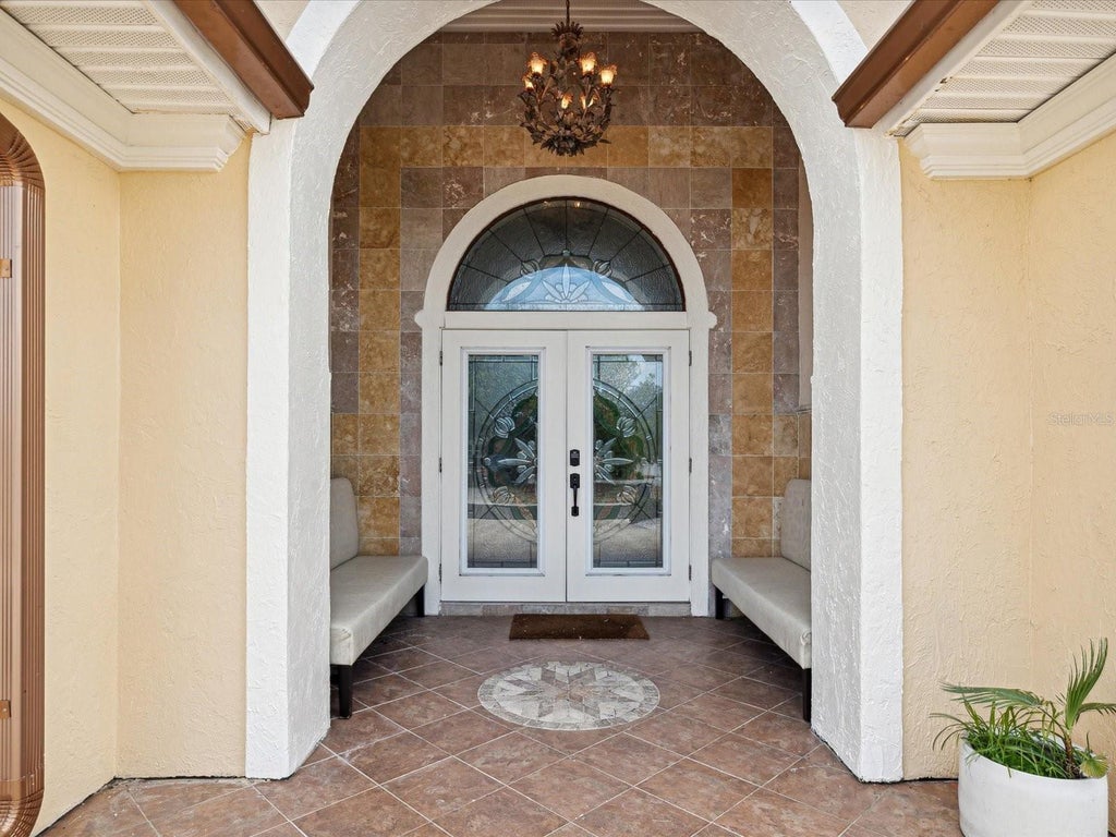 Photo of 108 24th Street, Belleair Beach, FL 33786 (MLS # TB8548471)