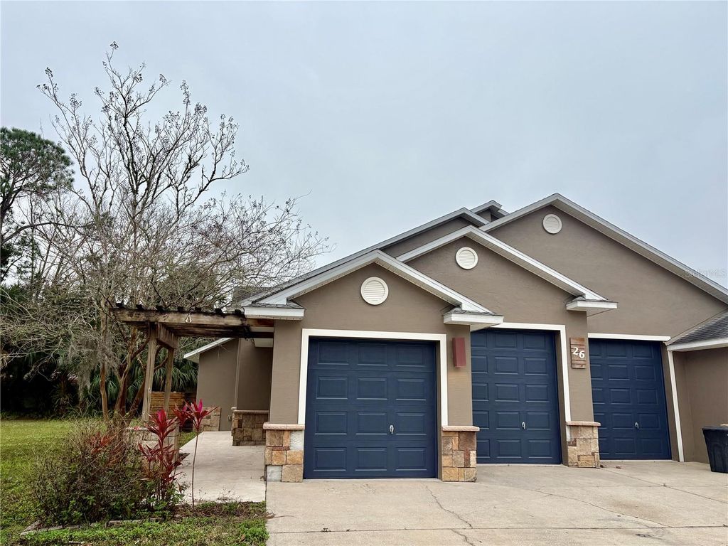 Photo of 26 Prosperity Lane #A, Palm Coast, FL 32164 (MLS # FC316156)