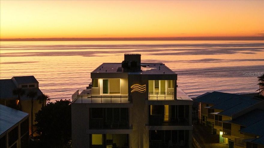 Luxury on the Coast defines this extraordinary penthouse residence.
Offering over 3,600 square feet of living space, four bedrooms, three with private en-suite baths, plus an elegant powder room for guests, this one-of-a-kind coastal contemporary architectural masterpiece delivers breathtaking views from every window.
Overlooking the Gulf coastline, each sunset becomes an unforgettable experience, while sunrise can be enjoyed from your private primary terrace  and your guests can do the same from their own suite terrace.
The stunning chef’s kitchen features a Thermador refrigerator and a Corian-style dream range, creating the perfect space for entertaining. Host gatherings with ease and serve guests on the expansive terrace overlooking the infinity-edge pool and spa, designed to visually spill into the beachfront beyond.
Perfectly situated on Manasota Key, this penthouse places you just minutes from island shopping, fine dining, waterfront restaurants, and entertainment — all while offering the privacy, serenity, and prestige of a true coastal retreat.
