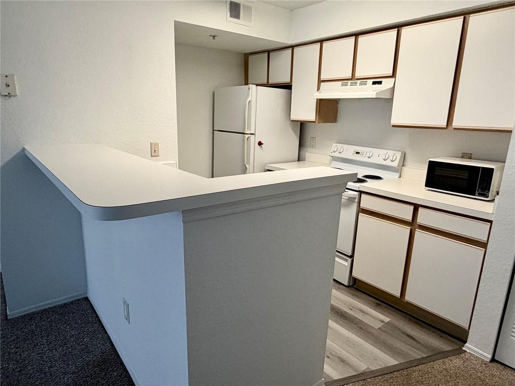 Photo of 2203 Key West Court #413, Kissimmee, FL 34741 (MLS # O6452267)