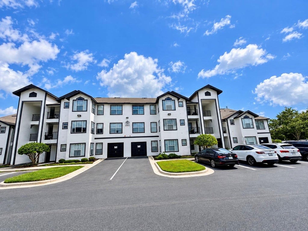 Photo of 2203 Key West Court #413, Kissimmee, FL 34741 (MLS # O6452267)