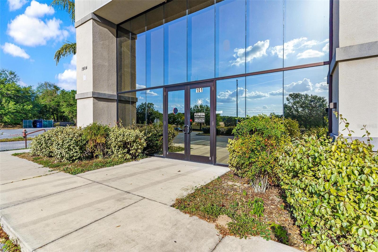 FIRST CLASS PROFESSIONAL OFFICE FOR LEASE! This state of the art office is loaded with upgrades and features, high speed data lines, LED lighting, PA system that includes white noise, security/fire alarms and the building is fully sprinkled. This unit is the showpiece of the property consisting of approximately 5,300 +/- sq ft with a beautiful entrance and impressive lobby featuring floor to ceiling glass and could be either turnkey for a new tenant. Space would be ideal for a customer service or call center, various health care services/uses, institutional, school, and church uses, or corporate office/headquarters. This unit also features a spacious kitchen/breakroom area, and several large rooms that could be used for classrooms, conference rooms or private offices. Property boasts phenomenal parking (90+ parking spaces) with easy access along main road. Located in the Heart of Central Florida less than an hour to Orlando or Ocala & minutes to the The Villages, I-75, FL Turnpike, US Hwy 441 & 27. With the future expansion of The Villages continuously heading closer to Leesburg along SR 44 (less than 5 miles to the west of this property) this would make an excellent investment! Just across the street there are over 500 new residential units now being built, further making this location an ideal Central Florida service location in the City of Leesburg. Per the City of Leesburg, Leesburg now boasts a population of 23,297 residents, and is located about 45 miles northwest of Orlando and 80 miles northeast of Tampa. The municipality includes 38 square miles and serves utilities to more than 50 square miles in north Lake County. The Leesburg business area attracts more than 50,000 people to work each weekday. Leesburg is open for your business!!!