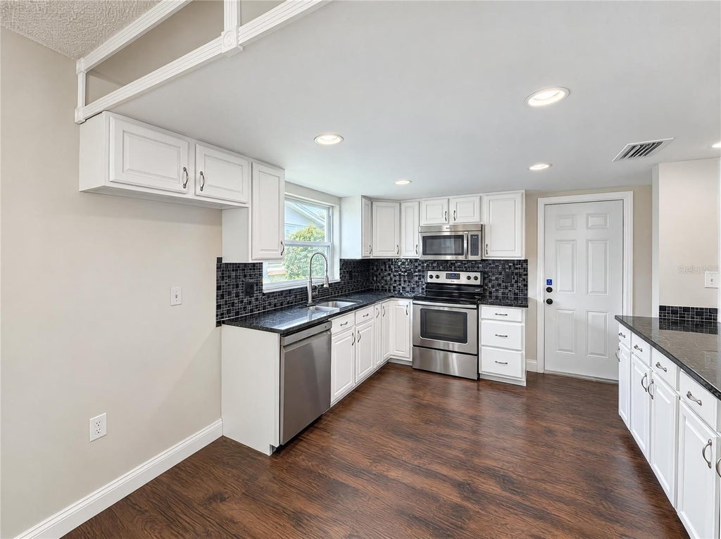 Photo of 8402 Moulton Drive, Port Richey, FL 34668 (MLS # O6452671)