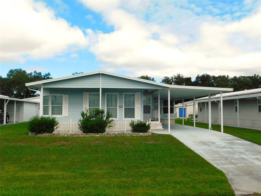 If you're looking for a winter vacation home or a forever home? Come on down to Betmar Acres, an active 55+ community where you own the land with a low YEARLY fee of $435. This nicely maintained 2BR/2BA home will be the perfect place for you. The breakfast nook has three windows, offering a bright space to enjoy a meal. The kitchen is spacious with plenty of cabinet and counter space. The open dining/living room is a great space or entertaining guests The Master bedroom is carpeted, has a walk in closet and and en-suite bathroom. The second bedroom is also carpeted, with a large closet, and is located close to the second bathroom. And as a bonus, there is a den/office that gives additional living space. Enjoy your morning coffee or chat with the neighbors in your comfortable Florida room, or on the front patio. A BRAND NEW ROOF HAS JUST BEEN INSTALLED!! And remember to check out the 27 hole golf course, 2 swimming pools and 2 hot tubs along with 3 clubhouses, a library, walking paths, game rooms , enclosed shuffleboard courts, tennis courts, pickle-ball courts, basketball court, and weekly cash Bingo. Don’t miss out on this one!