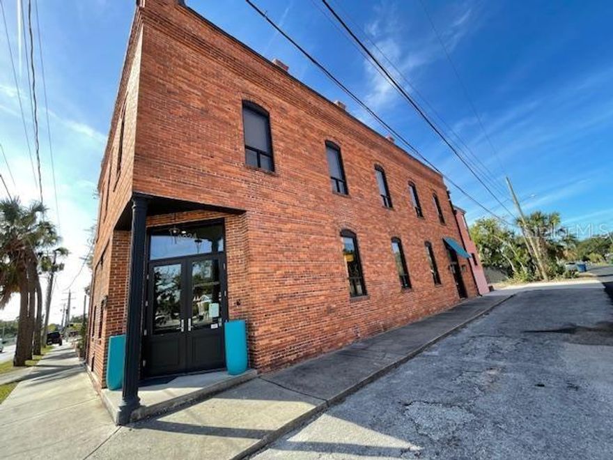 Office space available.  This space includes the entire second floor of the building.  The space is currently set up with 4 individual offices, a large open office (that could easily be converted into a conference room or additional offices), two large additional open areas (that could be used as storage, office space, a conference room, reception, etc.), a restroom, and an outdoor balcony area with stairs directly to parking lot.  There is currently office furniture in several of the rooms/offices that can stay or be removed.  There is a parking lot behind the building, as well as off-street parking on the north side of the building that could easily handle a total of 5 or more vehicles.  Utilities (electric, water, trash, sewer) will be split evenly with the downstairs business.  Owner of downstairs design business is willing to help design the layout of the upstairs space, if needed.  Space available immediately.  Looking for 12-month lease or longer.