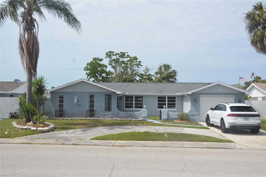 Photo of 6101 Seabreeze Drive, Port Richey, FL 34668 (MLS # TB8507594)