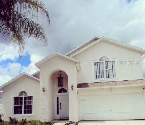 Photo of 17411 Woodcrest Way, Clermont, FL 34714 (MLS # O6440047)