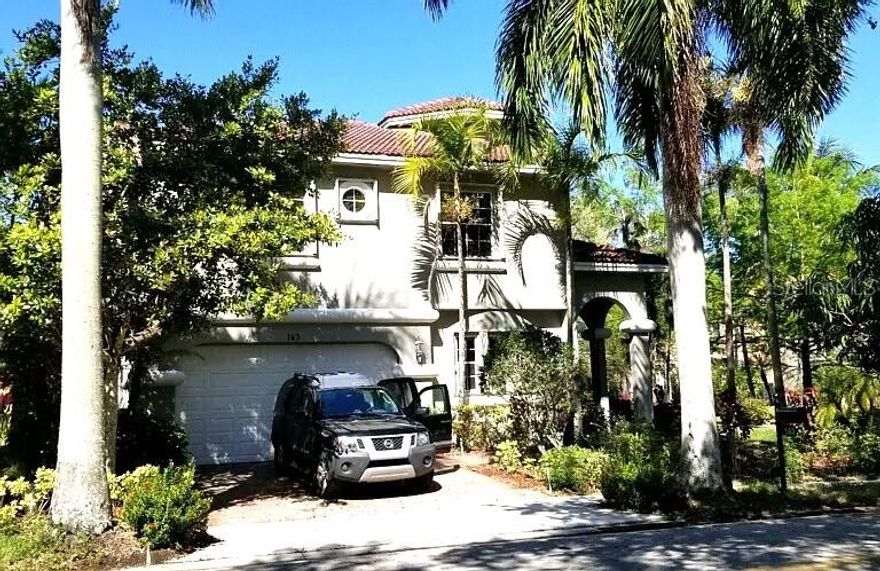 Mediterranean-style, 2-story single-family home. • Castle-like, elegant appearance inside and out Grand foyer entry with soaring vaulted ceilings
• •  Tile flooring throughout main living areas; a formal dining room, living room, and oversized family room
• •  Spiral staircase leads upstairs to the spacious master suite with abundant closet space 
• •  Features include a first-floor bedroom, pantry, and split-bedroom design
• Prime lakeside, corner-lot location with exceptional natural light
• Gated and quiet, yet walking-distance to school, shopping, and dining
• Spacious layout with luxury touches: vaulted ceilings, spiral staircase, formal and informal living areas
• •  Gated, guard-secured neighborhood with low traffic 
• •  Conveniently close to Sawgrass Mills Mall and American Heritage School 
• •  Centrally positioned for easy access to major highways like I 595