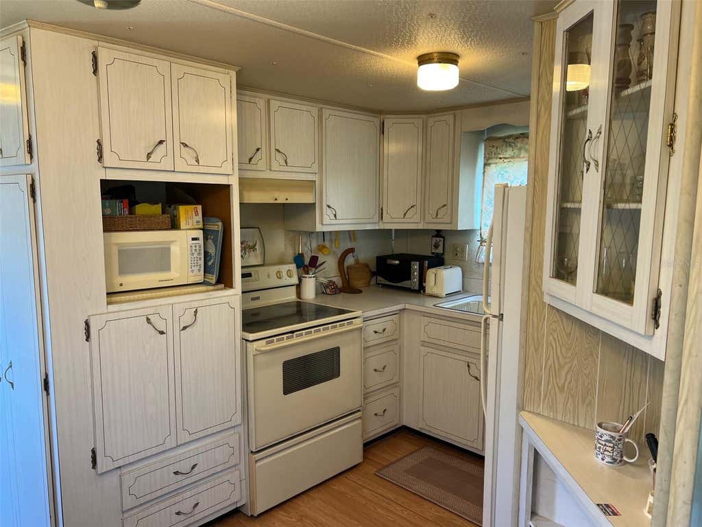 Photo of 12674 Seminole Boulevard #M1, Largo, FL 33778 (MLS # TB8516599)