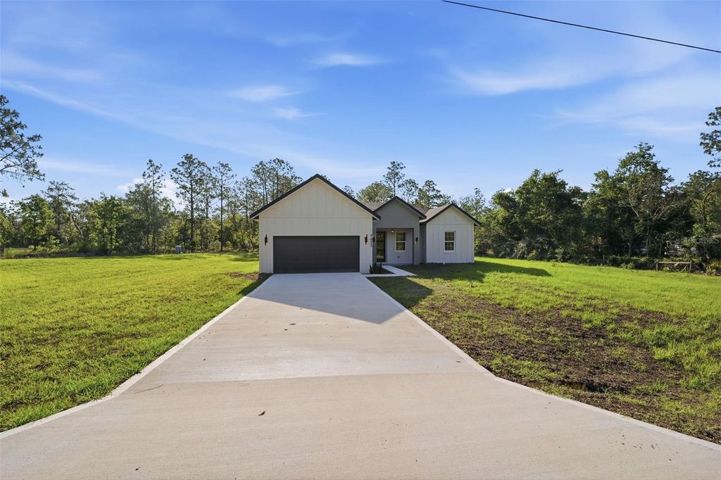 Photo of 7433 SW 138th Terrace, Dunnellon, FL 34432 (MLS # O6422697)