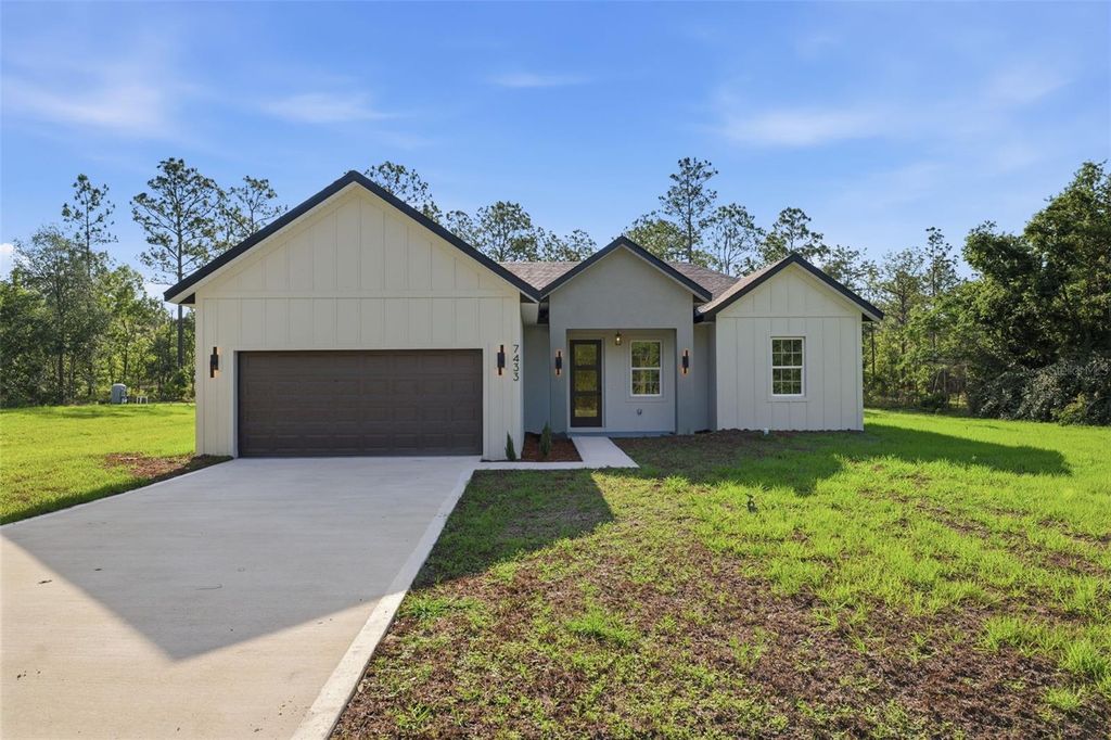 Photo of 7433 SW 138th Terrace, Dunnellon, FL 34432 (MLS # O6422697)
