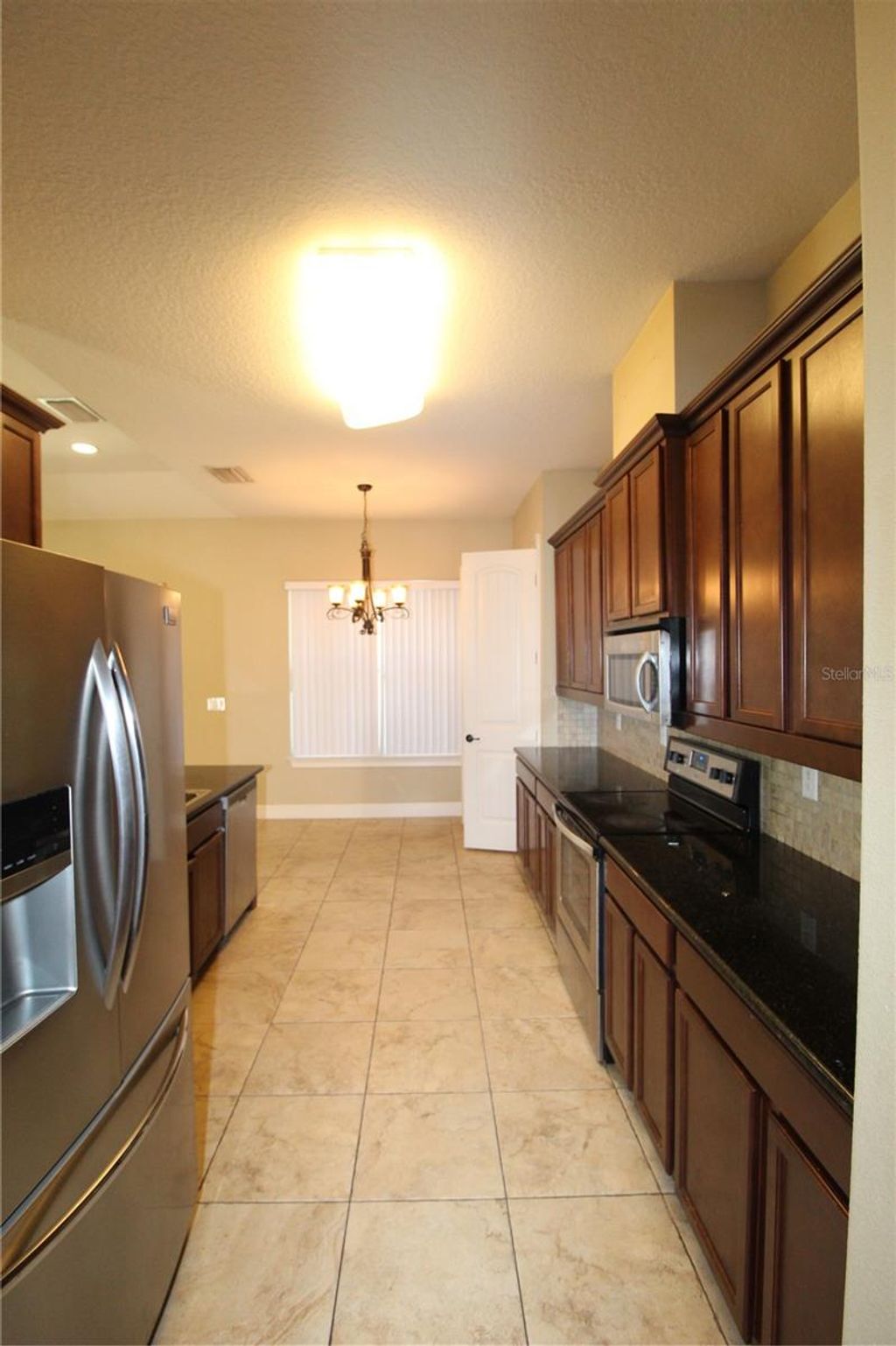 Photo of 5703 Kevin Avenue, Orlando, FL 32819 (MLS # O6380508)