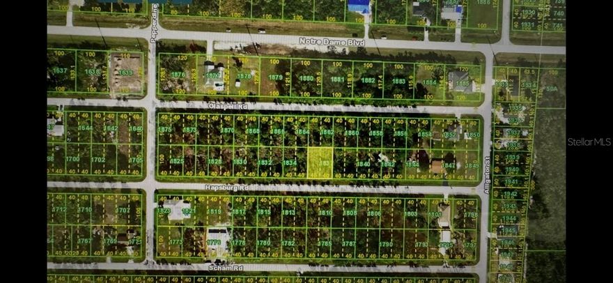 Build your dream home in Southwest Florida on this residential lot located in the growing community of South Punta Gorda Heights. Conveniently situated near Burnt Store Road and I-75, this property offers easy access to Punta Gorda, Fort Myers, Cape Coral, shopping, dining, golf, boating, and beautiful Gulf Coast beaches. Nestled between the Charlotte Harbor Preserve and historic downtown Punta Gorda, this location combines peaceful surroundings with everyday convenience. Enjoy nearby waterfront parks, marinas, restaurants, and the charming downtown district known for its shopping, events, and scenic views along the Peace River. This lot offers an excellent opportunity for a primary residence, seasonal getaway, or investment property in an area experiencing continued growth and development. No HOA fees and plenty of potential to create your own piece of Florida paradise.