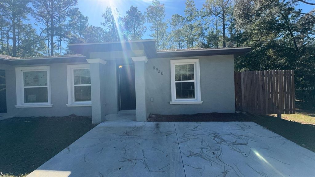 Photo of 8950 N Mendoza Way, Citrus Springs, FL 34434 (MLS # OM713411)