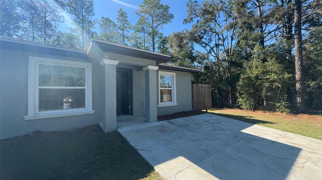 Photo of 8950 N Mendoza Way, Citrus Springs, FL 34434 (MLS # OM713411)