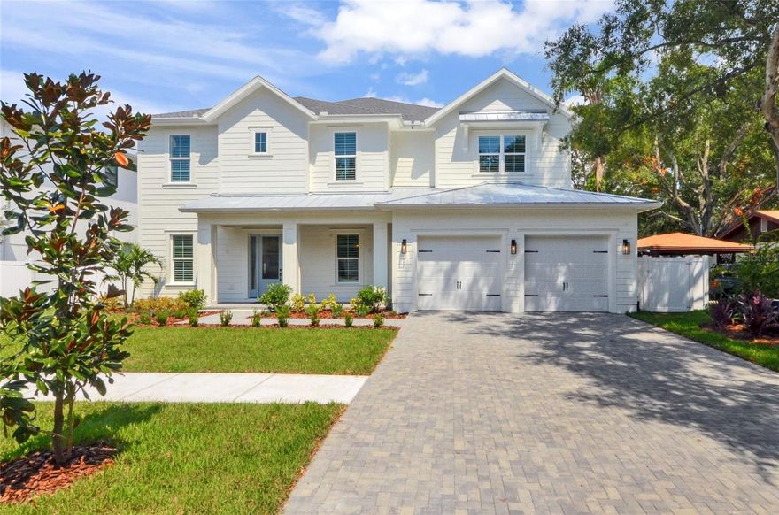 This beautiful new home welcomes you starting with the front porch which has a tongue and groove ceiling and recessed lighting. There are also traditional carriage lights. Inside you see hand scraped oak floors throughout, and tall ceilings with crown molding. The rooms are spacious and have lots of light There are custom window shutters upstairs and down and cool designer tile in bathrooms, kitchen and butler's pantry. The kitchen has beautiful quartz countertops and the stainless appliances are by Thermidor. The structural parts are excellent as well including zoned central HVAC units, 2 tankless gas water heaters one for upstairs and one for downstairs. The laundry room is upstairs. There is cat 6 wiring and wifi extenders. There are 5 bedrooms and four and one half baths, Four bedrooms including the main bedroom and three full bathrooms are located upstairs, while an additional bedroom and one full and one half bath are downstairs, Also on the second level is the large media or game room. Additional plan highlights include a separate room set off with French doors that can be an office or living room, a large dining room, full service butler's pantry with sink and wine refrigerator, a dream kitchen with a large island that has the sink and dishwasher. Another convenience is the six burner gas cook top, pasta filling water station, commercial refrigerator, and generous number of  wood kitchen cabinets, There is a  large pantry, a breakfast room off the kitchen prep area and very large great room so the entire interior living entertaining area all flow into one another. All of this overlooks a beautifully landscaped large outdoor entertaining space that a natural gas grill, sink and refrigerator. This covered area leads into the pool area that has marble pavers which surround the large tropical heated saltwater pool and spa. The pool features include a ledge, a sitting area in the water and an inviting continuous flow water feature. This entire space is enclosed by a generous white PVC fence and tropical landscaping for privacy and security. Plenty of additional backyard space all in full view from inside the home. All of this plus a three car attached garage and driveway pavers and sprinkler system. The lot is large, 75x135 lot and it is not in a flood zone The elevation showing on the site plan is 17.5. It is in the Grady Coleman and Plant school district, each A rated. This is a great home centrally located in south Tampa for easy access to virtually anything in the area.